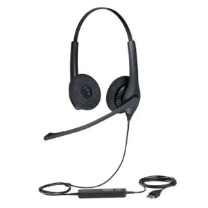 Black wired headset with a boom microphone and inline control, connected to a USB dongle/signaling adapter nearby