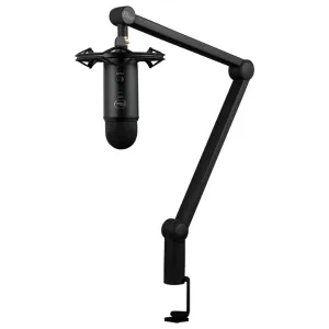 Black microphone mounted on an adjustable boom arm with desk clamp for podcasting or streaming setup — desktop recording gear.